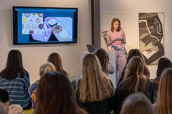 female student making presentation